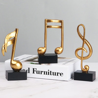 Ornements en résine de style européen en forme de notes de musique (note de portée haute), statue, trophée, décoration pour salle d'exposition de piano et salle de formation