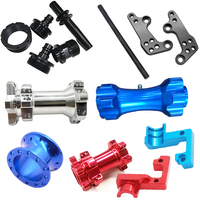 Pièces de supports industriels en acier inoxydable usinées par CNC de haute précision multicolores, composants rouges de haute qualité