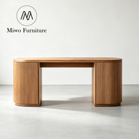Bureau d'étude et de travail contemporain au design moderne et épuré, table ovale en bois brun avec rangement pour ordinateur et jeux