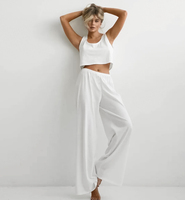QINSI 2025 femmes personnalisé 2 pièces vêtements de détente solide haut court sans manches pantalon vêtements de nuit femmes printemps été pyjamas