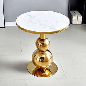 Tavolino <span class=keywords><strong>Rotondo</strong></span> Moderno di Lusso con Gambe in Acciaio Inox Dorato e Piano in Pietra Sinterizzata per Soggiorno - Product Image 1