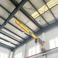 Grue à flèche fixe murale industrielle équipée d'un palan électrique assorti pour le transport de matériaux en intérieur