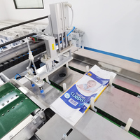 Chine Machine automatique d'ensachage de couches de bébé pour les couches d'enfants de sacs préfabriqués
