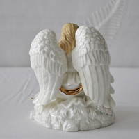 Figurine personnalisée en céramique porcelaine de lecture d'ange en céramique décorative antique pour la décoration de la maison