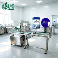 Machine de marquage laser dédiée aux boîtes de lait en poudre intégrant le codage haute vitesse, la vérification visuelle et le tri automatique des articles défectueux