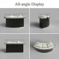 Vitrine de présentation de bijoux en acier inoxydable noir avec LED, luxueuse, moderne, écologique, verrouillable, en verre, pour boutique