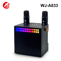 Haut-parleur KTV portable sans fil Bluetooth OEM d'usine avec 2 microphones, LED RGB rechargeables pour chant à domicile et en extérieur