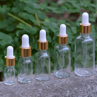 Klare Glas-Tropfflaschen 10ml 20ml 30ml 50ml 100ml, Parfüm- und Ätherische-Öl-Fläschchen mit Korb-Gold-Tropfverschluss