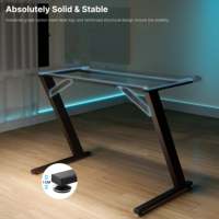 Bureau d'ordinateur en forme de Z AJUNION avec structure en acier, plateau en fibre de carbone, bureau de jeu avec éclairage LED RVB, supporte jusqu'à 200 livres