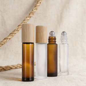 Botellas Portátiles de Vidrio con Rodillo y Tapas de Bambú, Opciones de Color Personalizadas, Tamaño de Viaje para Aromaterapia y Sueros para el Cuidado de la Piel - Product Image 1