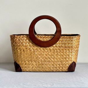 2025 Summer Hot Selling Casual Natural Grass Straw <b>Basket</b> Bag with Wood Handle Literary Retro Travel Beach Handbag - Product Image 5