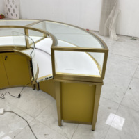 Comptoir de présentation de bijoux en U personnalisable de luxe avec écran LED et vitrine en verre trempé pour centre commercial et magasin de détail