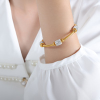Haut de gamme mode luxe filles en acier inoxydable fermoir magnétique Bracelet pierres précieuses serpent os chaîne cristal or Bracelets pour les femmes