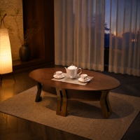 Table basse ovale personnalisée à coins arrondis, sécurisée pour les enfants, 1300x700mm, base en bois de bois noir africain massif, finitions métalliques pour salon