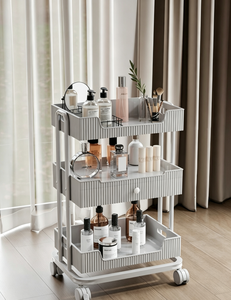 Chariot de rangement roulant blanc pour salon de beauté avec tiroir et plateaux en maille pour institut de beauté et studio de manucure - Product Image 1