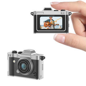 Fotocamera Digitale Mini Retrò in Vera Pelle con Texture Metallica, Super Leggera, Video HD CMOS, Impermeabile, Certificata ROHS per Foto Istantanee - Product Image 1