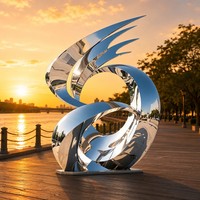 Sculpture contemporaine abstraite grandeur nature en acier inoxydable avec design de courbes fluides polies pour exposition en galerie d'art