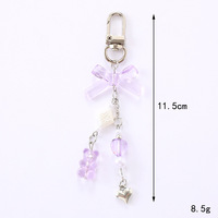 Porte-clés Y2K Ours en peluche avec nœud en forme d'étoile et de cœur, pendentif mignon rose en résine acrylique et lucite, accessoire de téléphone portable tendance