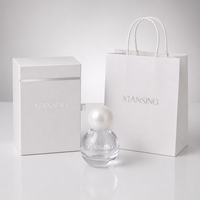Vente en gros de flacons de parfum ronds vides 30ml 50ml 100ml, flacons de parfum en verre avec bouchons à bille et emballage en boîte, logo personnalisé
