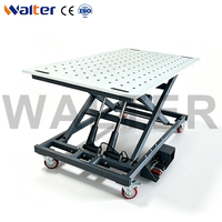 Nouvelle table de soudage 3D à ciseaux hydrauliques robustes avec hauteur réglable et structure stable pour travaux de soudage multi-angles