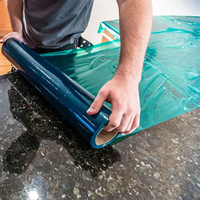 Film de protection temporaire pour tapis en LDPE personnalisable, directement de l'usine, résistant à l'humidité et à la poussière, idéal pour les fêtes et la rénovation