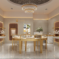 Sundo Hochwertige Edelstahl-Gold-LED Wasserdichte Schmuck-Vitrine Maßgefertigter Ausstellungsständer für Einzelhandelsgeschäfte