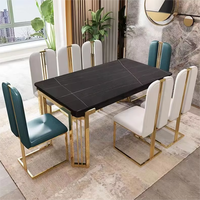 Mobilier de Salon Foshan Luxe pour Salle à Manger, Ensemble Table et 8 Chaises pour Villa