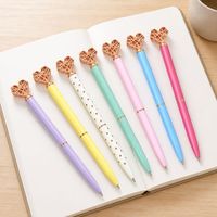 Stylo à bille en alliage métallique en forme de cœur, creux, avec grand diamant en cristal incrusté, écriture fluide 1,0 mm, cadeau pour étudiant