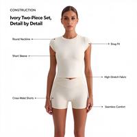 Ensemble de yoga 2 pièces personnalisé pour femme avec soutien-gorge intégré, haut court à manches courtes et short cycliste taille croisée en V pour l'entraînement