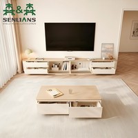 Petit meuble TV moderne avec corps blanc crème, dessus en bois de chêne, tiroirs et étagère vitrée ouverte pour salon