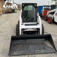 Chargeuse compacte Bobcat S160 d'occasion, mini-chargeuse en bon état de marche pour projets d'aménagement paysager, prête à être expédiée