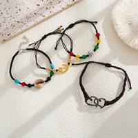 Ensemble de 4 bracelets en alliage noir avec breloques, coquillages, fer à cheval, cœur et croix, bijoux bohèmes, cadeau pour femme