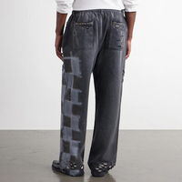 Pantalon de survêtement ample et large pour homme, avec bords effilochés, imprimé par pulvérisation, taille à cordon, style vintage délavé, streetwear, effet usé