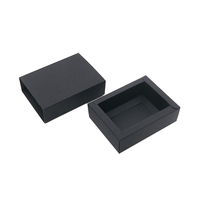 Boîte à tiroir noire mate écologique sans poignée avec gaufrage pour un branding minimaliste de cosmétiques, accessoires technologiques et cadeaux haut de gamme