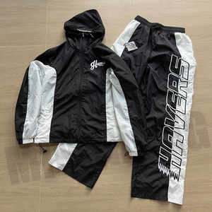 Conjunto de chaqueta cortavientos con logotipo bordado de nailon personalizado Chándales ligeros a prueba de viento de retazos - Product Image 5