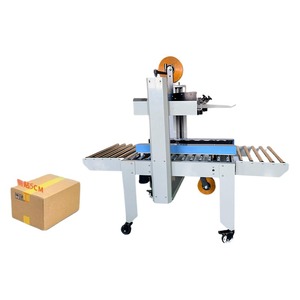 Machine automatique de scellage de cartons – Scelleuse de ruban adhésif supérieur et inférieur pour la fermeture des boîtes en carton – Ligne d'entrepôt - Product Image 1