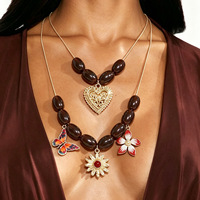 Collier ras du cou vintage exagéré en résine perlée, pendentif cœur, fleur, papillon, multi-couches, collier statement