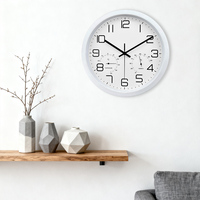 Horloge murale à quartz moderne en plastique analogique avec affichage de la température et de l'humidité, réglage automatique de l'heure, forme ronde pour salon