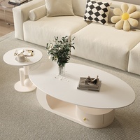 Table basse ovale moderne avec plateau en ardoise et structure en acier au carbone pour petits appartements et salons