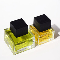 Bouteilles en verre de parfum carrées en cube de luxe de 50ml 100ml Bouchons carrés en bois à bille de couleur transparente personnalisée pour diffuseur d'emballage