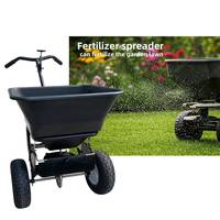 Esparcidor de fertilizante de hierro manual pequeño empujado a mano con soporte OEM personalizable