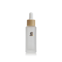 Vente en gros de flacons compte-gouttes en verre à fond rond givré de 20 ml, 25 ml, 30 ml pour emballages cosmétiques vides