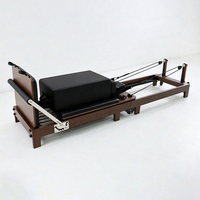 Machine de Pilates Reformer en bois de chêne pliable, portable et durable, personnalisable, avec lit de base pour l'entraînement corporel