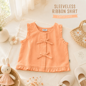 Adorable chemisier sans manches pour filles, fabriqué en coton doux, qui crée des moments confortables pour les jeux, l'école et les sorties en famille. - Product Image 4