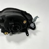 Vente directe d'usine, ensemble de phares avant halogènes, compatible avec les modèles d'origine avec lentille transparente blanche pour Mitsubishi L200 05