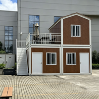 Maison conteneur modulaire préfabriquée en acier à deux étages détachable avec balcon, taille et aménagement personnalisables pour bureau, dortoir, hôtel
