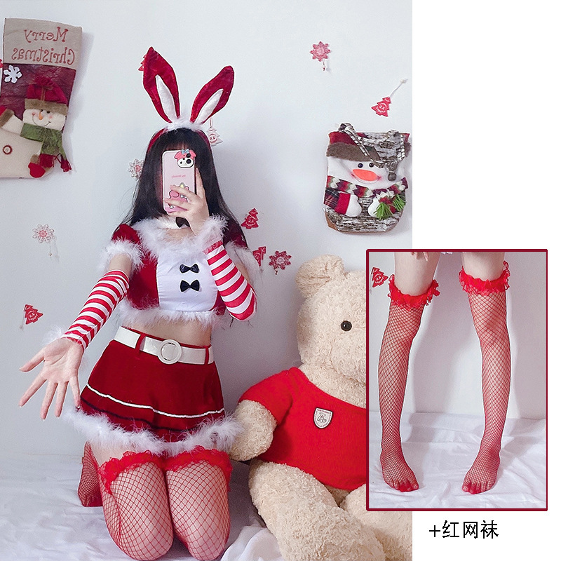 Tenue de Noël rouge avec des bas résille rouges