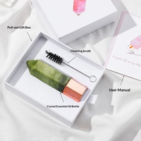 Bouteille d'huile essentielle pour massage facial par acupression, en cristal hexagonal naturel violet, rose et blanc, pour les professionnels.