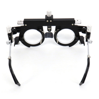 Frame Uji Coba Titanium AIST yang Dapat Disesuaikan untuk Pengujian Mata Optometri dan Pemasangan Lensa Optik