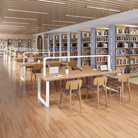 Table de bibliothèque en bois couleur bois avec cloison, bureau de lecture long combiné avec étagère pour plusieurs personnes dans une salle d'étude scolaire